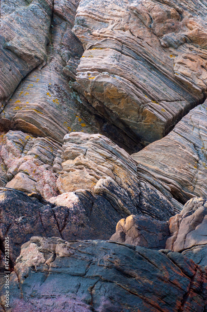 close-up of weathered rock formations with intricate textures.
