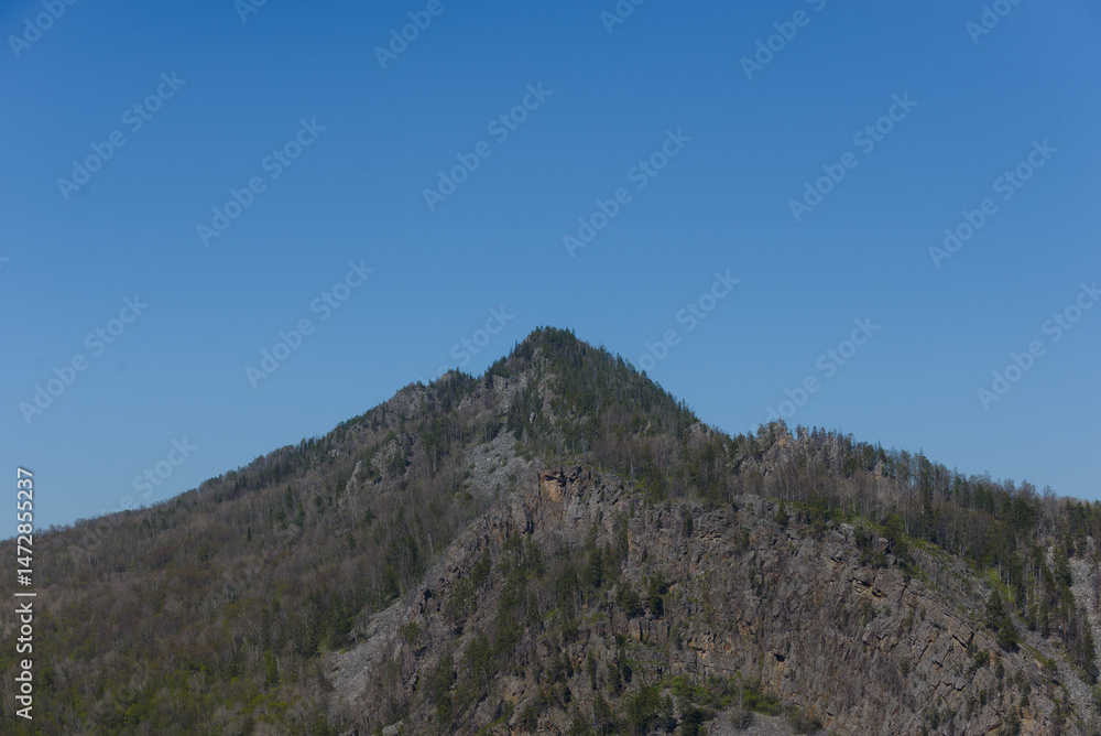 Obraz premium Epic mountain against blue sky. Mountain landscape.
