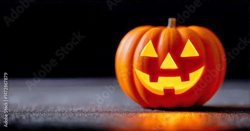 Halloween Pumpkin With Glowing Face Displayed During Evening Festivities