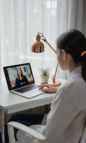 Student on Laptop in Video Call with Tutor, Over-the-Shoulder View, Cozy Study Nook with Desk Lamp and Plant, Top-Side Negative Space, Photorealistic Remote Learning Scene