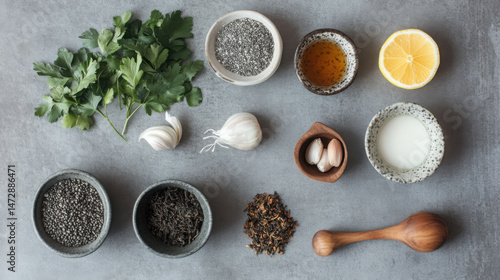 Immunity Boost: Herbal Tea and Ingredients on Grey Table

 photo