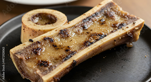 Roasted Bone Marrow Delicacy Served on Elegant Black Plate