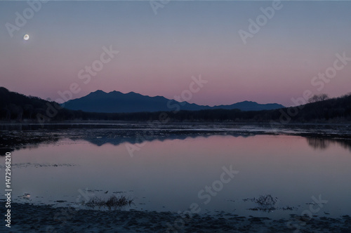 Frozen lake in after sunset