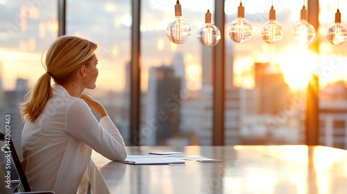 Woman Looking Out Window in a Modern Office