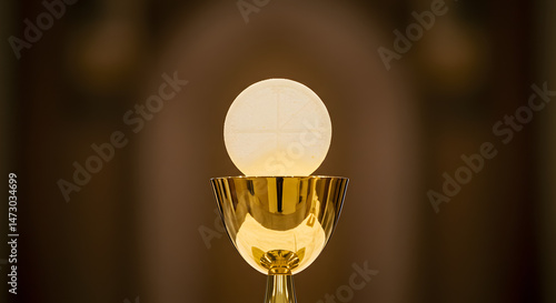 Symbolic Representation of Communion and Faith A Sacred Chalice with Eucharist Host