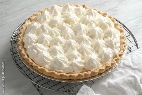Creamy pie topped with generous dollops of whipped cream