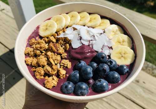 Blueberry and banana smoothie in a bowl.