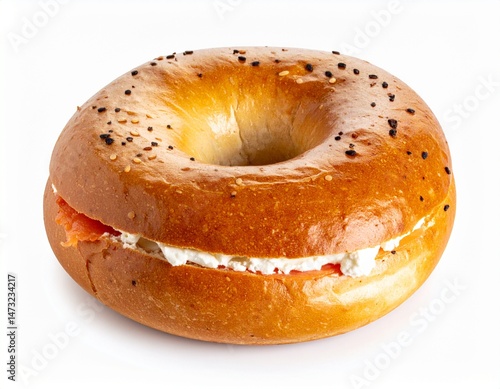 A perfectly baked bagel, halved and filled with cream cheese and salmon. Seeds dot the golden crust. A tempting treat
