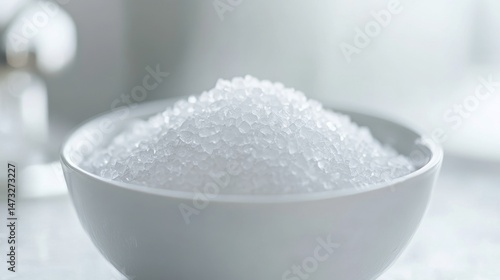 White Ceramic Bowl Filled with Crystals of Flavor Enhancer Ingredient