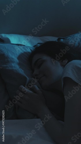 Wallpaper Mural Vertical video. Night rest. Peaceful sleep. Relaxed calm happy woman enjoying dreaming on soft comfortable soft pillow in bed in dark home bedroom. Torontodigital.ca