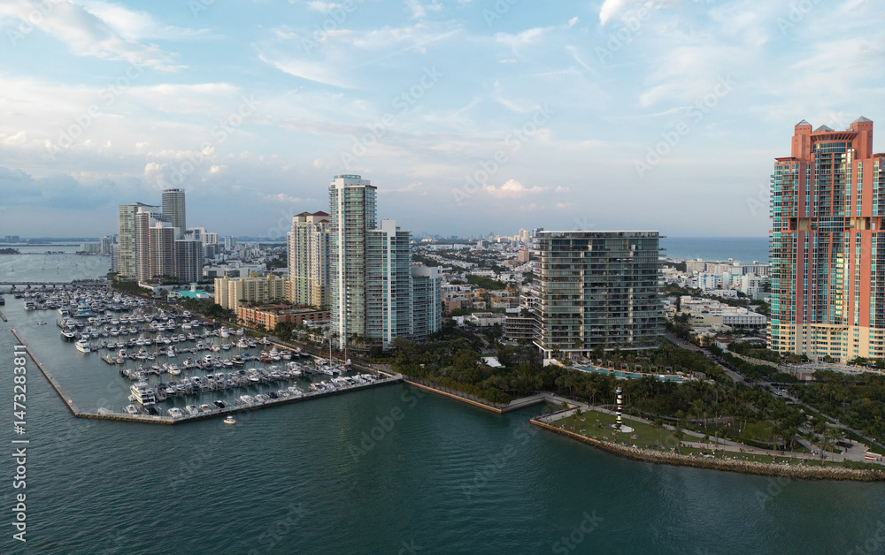Fototapeta premium Miami Beach skyline. Sandy beaches of Miami. Seashore of Miamis famous beaches. South Pointe beach with skyscrapers. Miami city panorama. Miami skyline and ocean. South Florida. South Beach.
