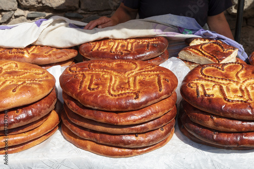 Armenia, Ararat Province, Goght. Ornately decorated Gata (sweet bread) for sale.