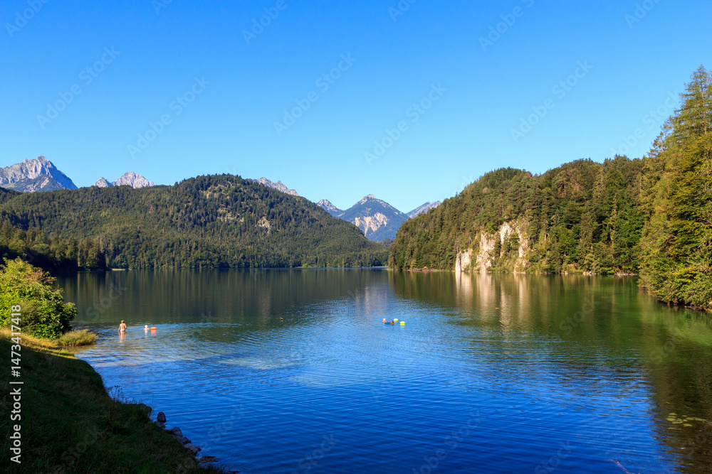 Naklejka premium Lake Alpsee with mountain alps panorama in Bavaria, Germany
