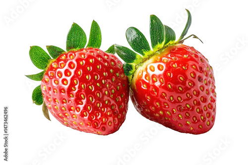 Close up view of two vibrant red strawberries with green leaves attached on transparent background png