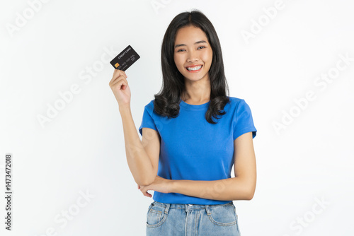 Smiling asian woman hand holding credit card on white background.