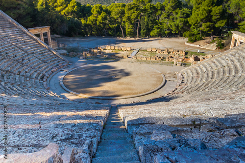 Ancient Theatre of Epidaurus is theatre in Greek city of Epidaurus, located on southeast end of sanctuary dedicated to the ancient Greek God of medicine, Asclepius in Peloponnese, Greece