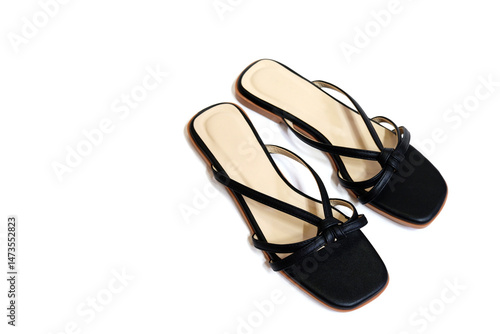 Summer women's black sandals on white background. Women's black leather sandals.