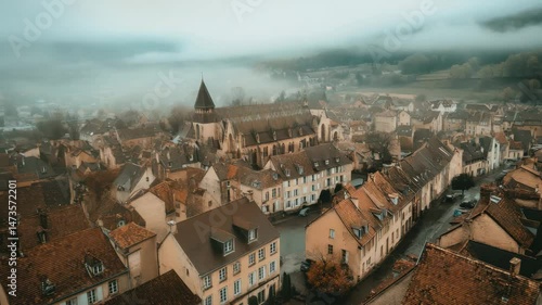Wallpaper Mural View of Beaune old town in France under a cloudy sky showcasing historic architecture and winding streets, Aerial of the old town of Beaune in France on a cloudy morning in early spring Torontodigital.ca