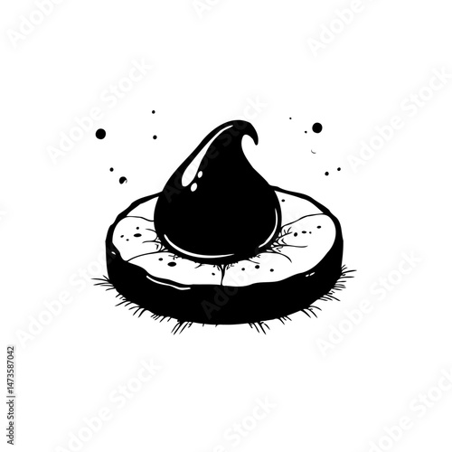 Minimalist confection representation showcasing a glossy drop on a textured base