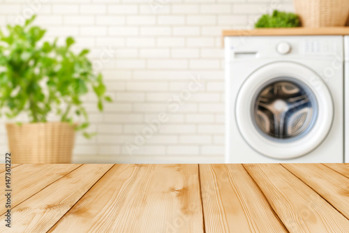 Empty wooden table with blurred washing machine in background