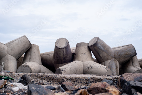 Bai da ong dia beach with tetrapods on the beach against the blue sky Mui Ne, Vietnam.