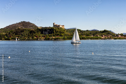 Lake Maggiore, Sailing Boat, island with a castle Rocca Borromeo di Angera.