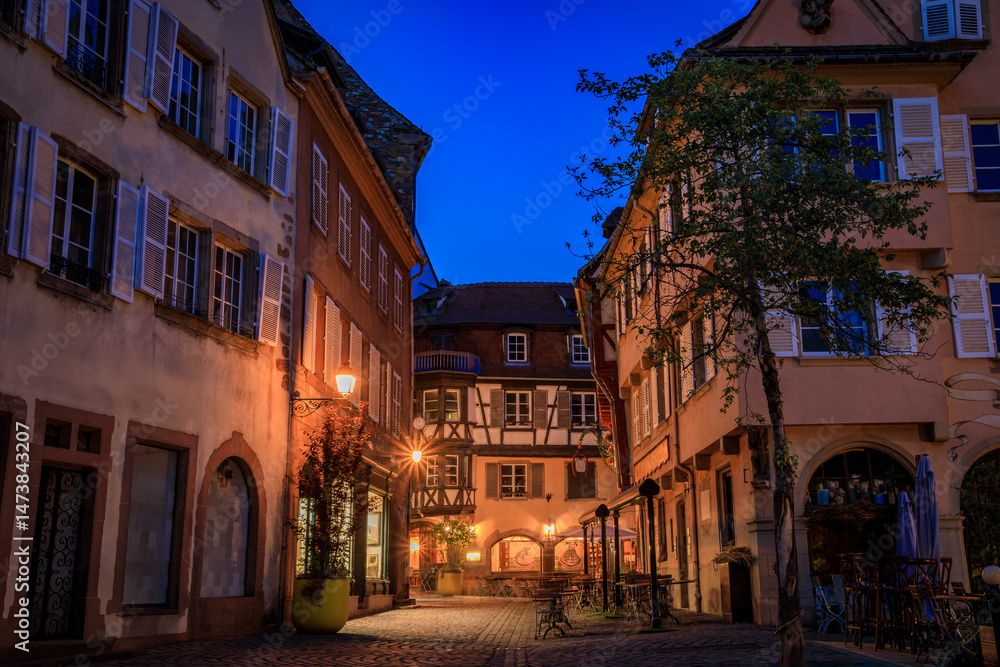 Obraz premium Ornate facades of the traditional half timbered houses in the Little Venice district in Colmar, picturesque village in Alsace France at sunset
