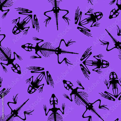 Seamless pattern. Skeletal system of animals. Black frog and lizard bone structure isolated on a violet background. Amphibian and reptiles silhouettes.
