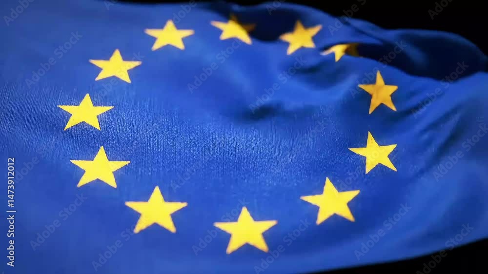 Close-up view of the European Union flag with its circle of twelve golden stars waving. Close-up view of the European Union flag with its circle of twelve golden stars waving.