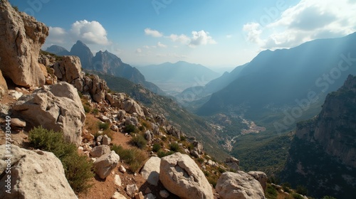 Sun-drenched peaks of Sierras de Tejeda, Almijara y Alhama seen from above at midday.