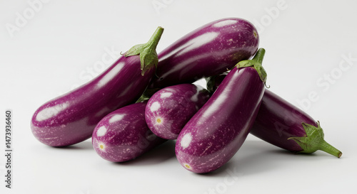 Wallpaper Mural Pile Of Purple Eggplants With Green Stems Isolated On White Background Studio Shot Of Fresh Vegetables Torontodigital.ca