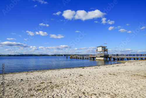 Fototapeta Naklejka Na Ścianę i Meble -  View of the pier and the Baltic Sea near Glücksburg. Landscape on the Flensburg Fjord.
