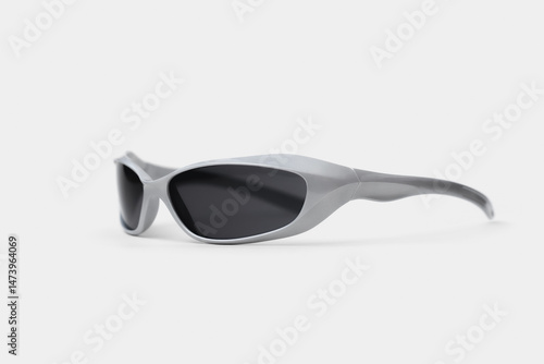 Vintage sport sunglasses with a white wraparound frame and dark lenses, isolated on white. Perfect for retro fashion, active lifestyle, or summer style themes.