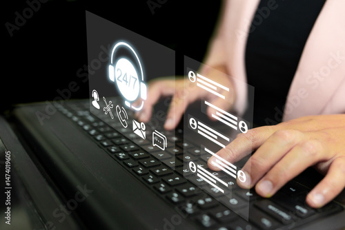 Hands on a keyboard with a digital overlay showing 24/7 customer support icons including a headset, tools, call, chat, and email, reflecting tech-based customer service and assistance systems.