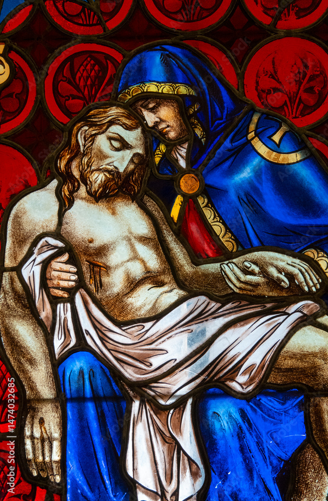 Fototapeta premium Stained glass (1939) of The Pietà.