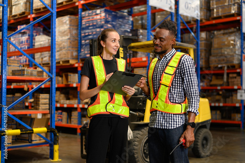 warehouse worker brainstorms checklist product to shelf in warehouse store. industry logistic export import distribution concept.