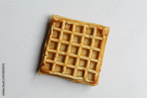 One plain waffle cake, isolated on white background