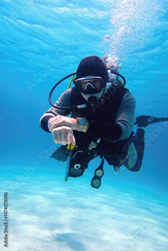 Wallpaper Mural Fully equipped man scuba diver underwater in the blue water Torontodigital.ca