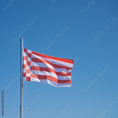 Die Bremer „Speckflagge“ weht im Wind photo