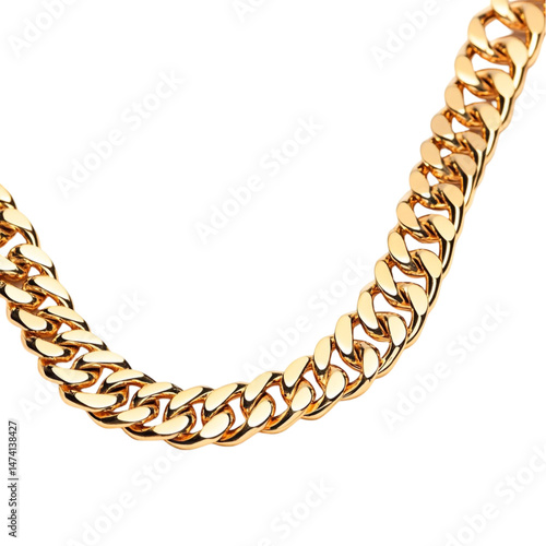Gold chain necklace on vibrant yellow and multicolored striped background