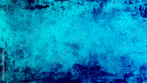 A close up of a grainy blue concrete studio wall . Blue textured plaster background with vignette effect for design projects Grungy abstract backdrop with ample copy space image