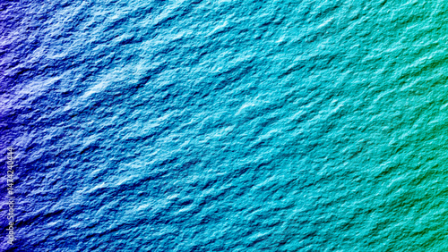 A close up of a grainy blue concrete studio wall . Blue textured plaster background with vignette effect for design projects Grungy abstract backdrop with ample copy space image