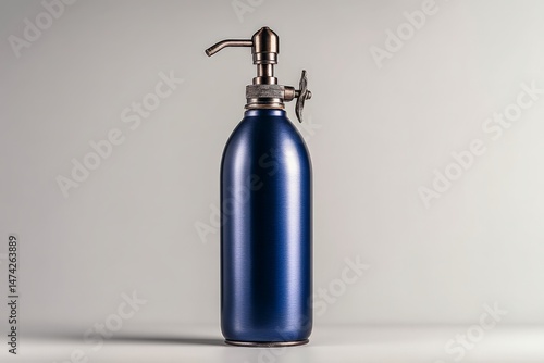 Metal soda siphon in a sleek design with metallic finish, suitable for creating carbonated beverages at home