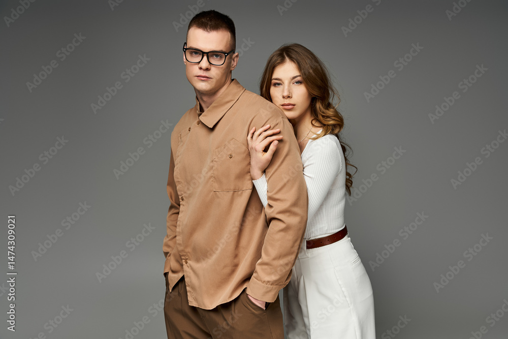 Elegant couple exudes romance in a modern studio setting surrounded by love and joy Elegant couple exudes romance in a modern studio setting surrounded by love and joy