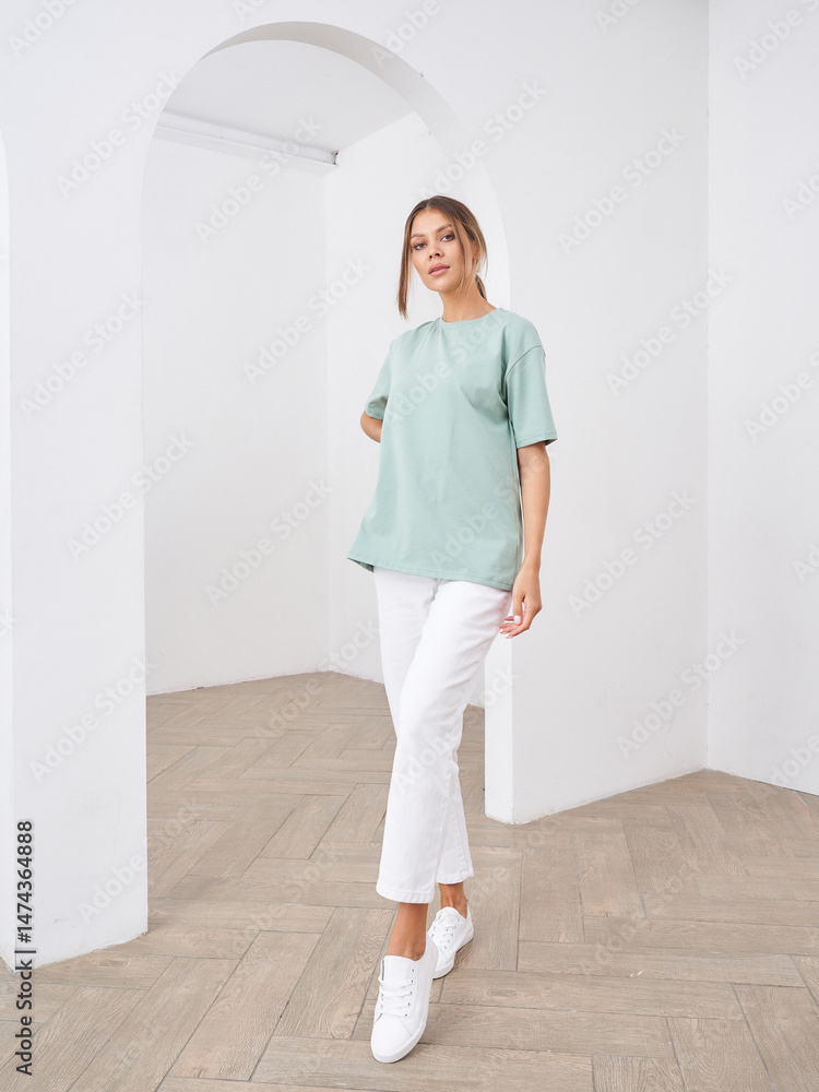 Fashion Model Showcases Casual Outfit in Modern Indoor Setting During Daytime Fashion Model Showcases Casual Outfit in Modern Indoor Setting During Daytime