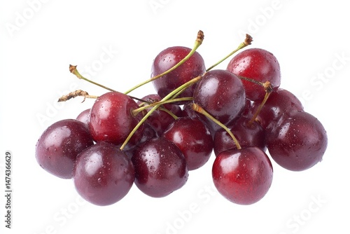 A cluster of ripe, dark red cherries, glistening with moisture, on a white background.