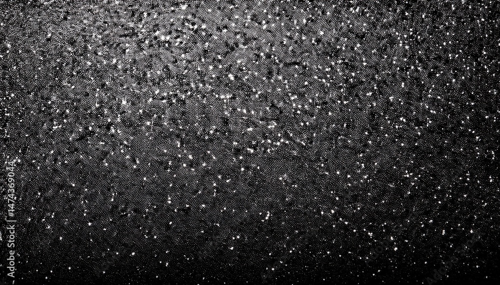 Obraz premium a black and white grainy textured background with a white noise effect creating a static and gritty appearance the rough texture adds depth and interest making it suitable for various design applic