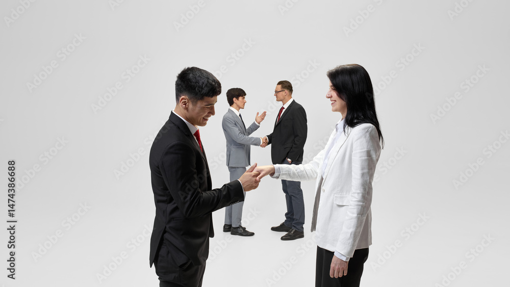 Fototapeta premium Business professionals shake hands against white studio backdrop, signifying multiple business agreements. Concept of foreign policy, management, democracy, diplomatic interactions. Ad