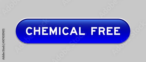 Blue color capsule shape button with word chemical free on gray background