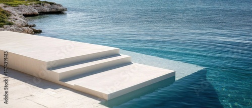 Minimalist Infinity Pool Steps Leading to the Turquoise Ocean on a Sunny Day Coastal Luxury Resort